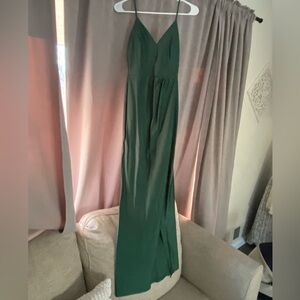 Windsor emerald green spaghetti strap maxi gown with slit. Size small